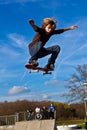 Young boy going airborne with his skateboard Royalty Free Stock Photo