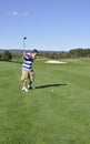 Young boy on golf course