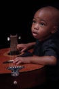 Young boy with guitar Royalty Free Stock Photo