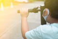 Young boy hands holding handlebar on a scooter Royalty Free Stock Photo