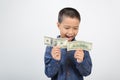 Young boy with happy and smile with american dollar Royalty Free Stock Photo