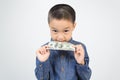 Young boy with happy and smile with american dollar Royalty Free Stock Photo