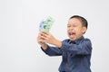 Young boy with happy and smile with korean won bank note Royalty Free Stock Photo