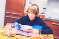 Young boy having breakfast before going to school New day of everyday life