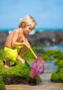 Young boy having fun on tropcial beach