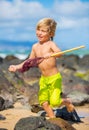 Young boy having fun on tropcial beach