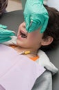 Young boy having his teeth checked at the dentist Royalty Free Stock Photo