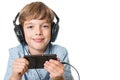 Young boy with headphones listening the music Royalty Free Stock Photo