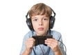 Young boy with headphones listening music Royalty Free Stock Photo