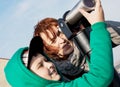 Young boy with her grandmother looking through a telescope Royalty Free Stock Photo