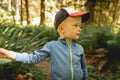 Young boy on a hike in the Hoh Rainforest in Olympic National Park