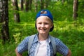 Young boy hiking in forest