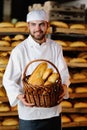 Young boy holding a basket with bakery products Royalty Free Stock Photo