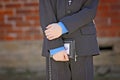 Young boy holding a bible hands close up