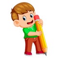 A young boy holding big pencil Royalty Free Stock Photo