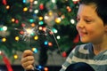 Young boy holding sparkler Royalty Free Stock Photo