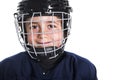 Young boy in ice hockey gear against white Royalty Free Stock Photo