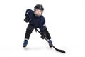 Young boy in ice hockey gear against white Royalty Free Stock Photo