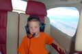 Young Boy Inside a Private Airplane