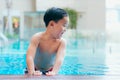 Young boy kid child eight years old in swimming pool having fun Royalty Free Stock Photo