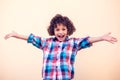 Young boy kid shows hugs with open arms Royalty Free Stock Photo