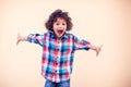 Young boy kid shows hugs with open arms Royalty Free Stock Photo