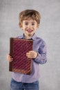 Young boy learns to be a businessman, unhappy face Royalty Free Stock Photo
