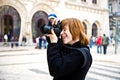 Young boy likes fotography even when his arm is in blast due to Royalty Free Stock Photo