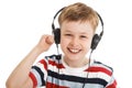 Young boy listening a music in a headphones isolated Royalty Free Stock Photo