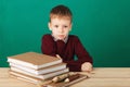 Young boy looking angry shaking his fists tired of school lesson Royalty Free Stock Photo