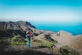 Young boy looking through binocular while travel in nature Royalty Free Stock Photo