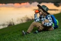 Young boy looking through binoculars. Little explorer. Outdoor recreation and adventures with kids. Child tourist on Royalty Free Stock Photo