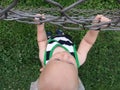 Young Boy Looking Through Fence Royalty Free Stock Photo