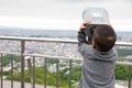 Young boy looking through the telescope Royalty Free Stock Photo
