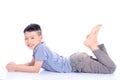 Young boy lying down on the floor