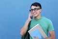 Young boy making fun plans on the phone with space for copy Royalty Free Stock Photo