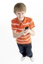 Young Boy With Mobile Phone Royalty Free Stock Photo