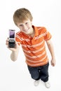 Young Boy With Mobile Phone Royalty Free Stock Photo