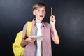 Boy with notebook and pen Royalty Free Stock Photo