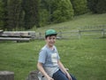 Young boy outside in the mountains Royalty Free Stock Photo