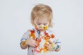 The young boy painted his face, hands and clothes with paint Royalty Free Stock Photo