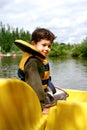 Young boy in pedalo Royalty Free Stock Photo