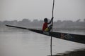 Young boy in a pirogue