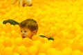Young boy and plastic balls