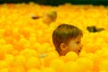 Young boy and plastic balls