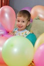 Young boy playing with balloons Royalty Free Stock Photo