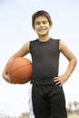 Young Boy Playing Basketball Royalty Free Stock Photo