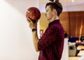 Young boy playing bowling alone Royalty Free Stock Photo