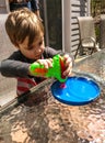 Young Boy Playing with Bubble Machine Royalty Free Stock Photo