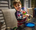 Young Boy Playing with Bubble Machine Royalty Free Stock Photo